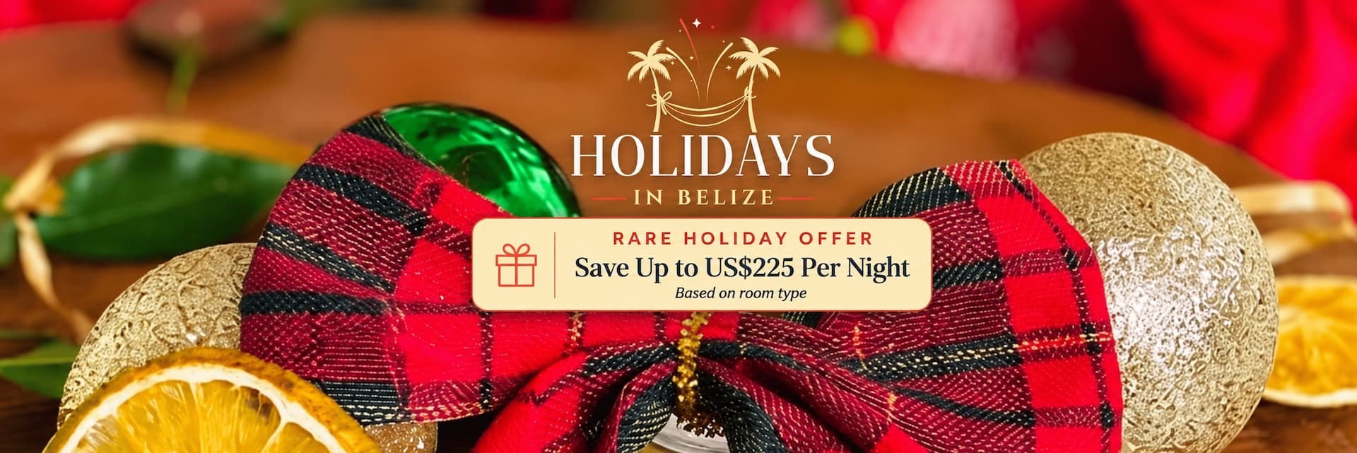 Holiday decoration with a plaid bow and ornaments promoting a Belize vacation offer.