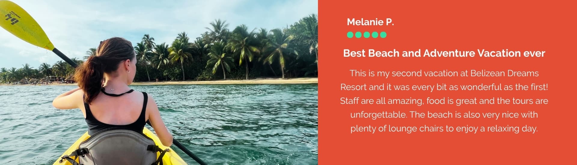 A person kayaking in clear water with palm trees in the background.