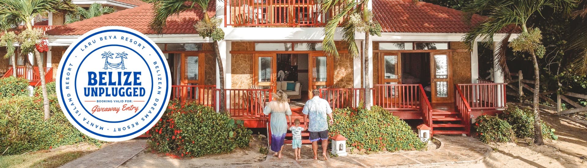 A couple strolls towards a beachside resort surrounded by palm trees and colorful flowers, with a logo for "Belize Unplugged" in the foreground.